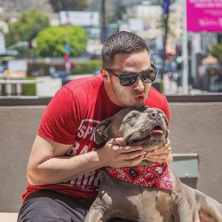 Jon Mancinetti, rescuer, writer and director of award winning short film, Loss And Found wearing our #endBSL Tee.
